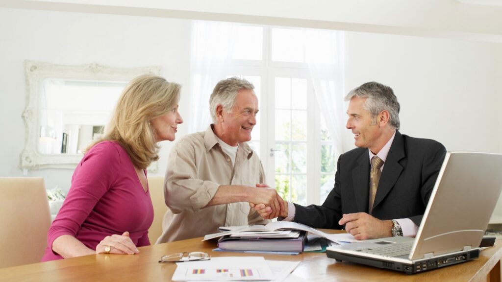 Couple talks with a financial advisor